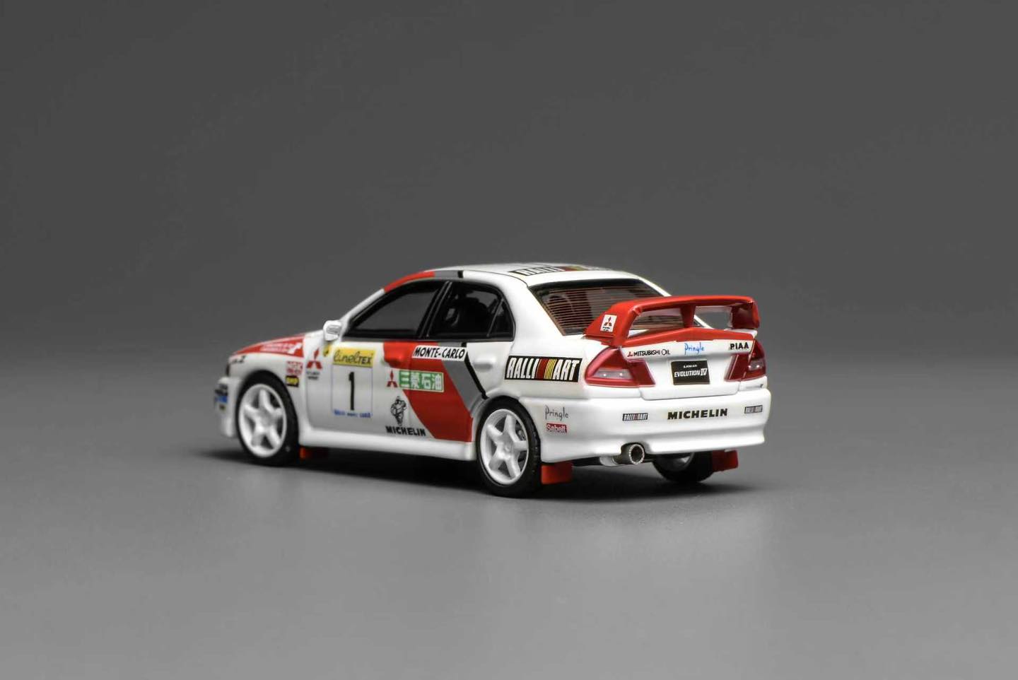 MOTORHELIX 1/64 MITSUBISHI LANCER EVOLUTION IV GSR MONTE CARLO LIVERY M64010