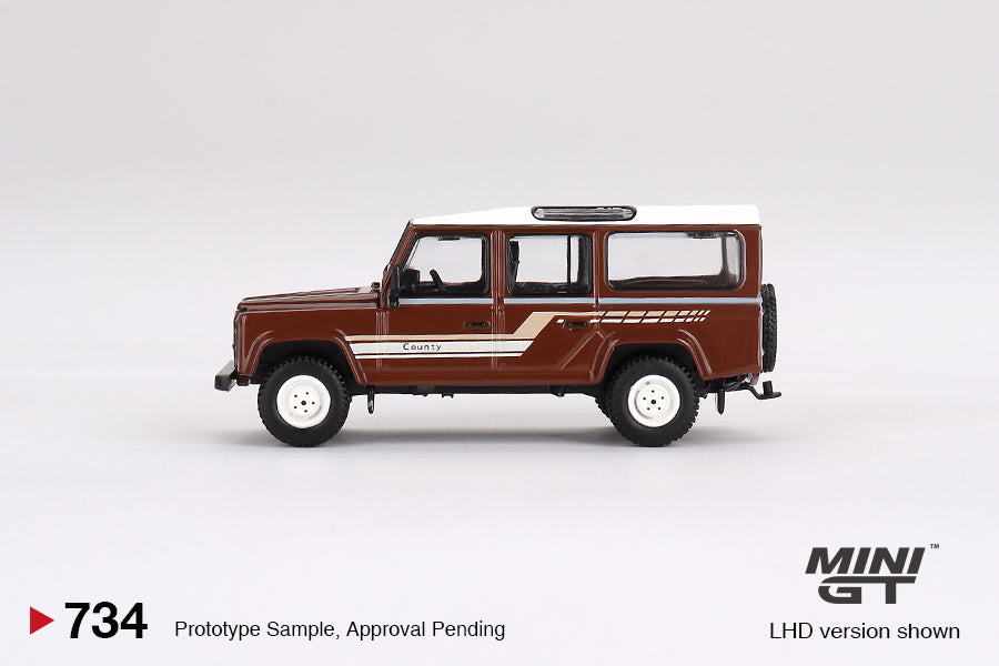 * PRE ORDER * MINI GT #734 1/64 Land Rover Defender 110 1985 County Station Wagon Russet Brown ( RHD )