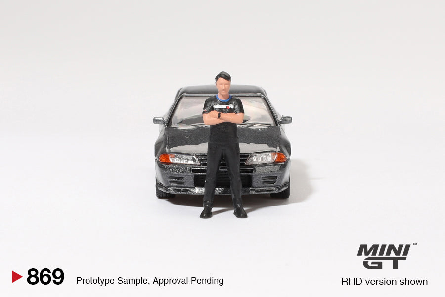 MINI GT #869 1/64 Nissan Skyline GT-R (R32) Gunmetal W/ Matsuda Figure Tsugio Matsuda Collection