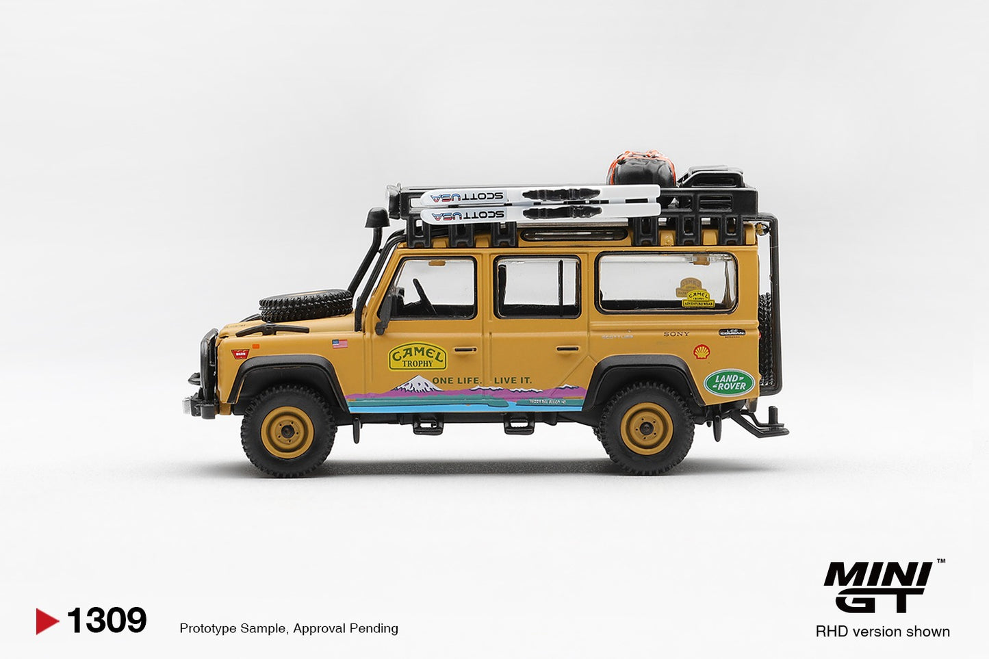 * PRE ORDER * MINI GT #1309 1/64 Land Rover Defender 110 1998 Camel Trophy Tierra del Fuego CT.10 USA (RHD)