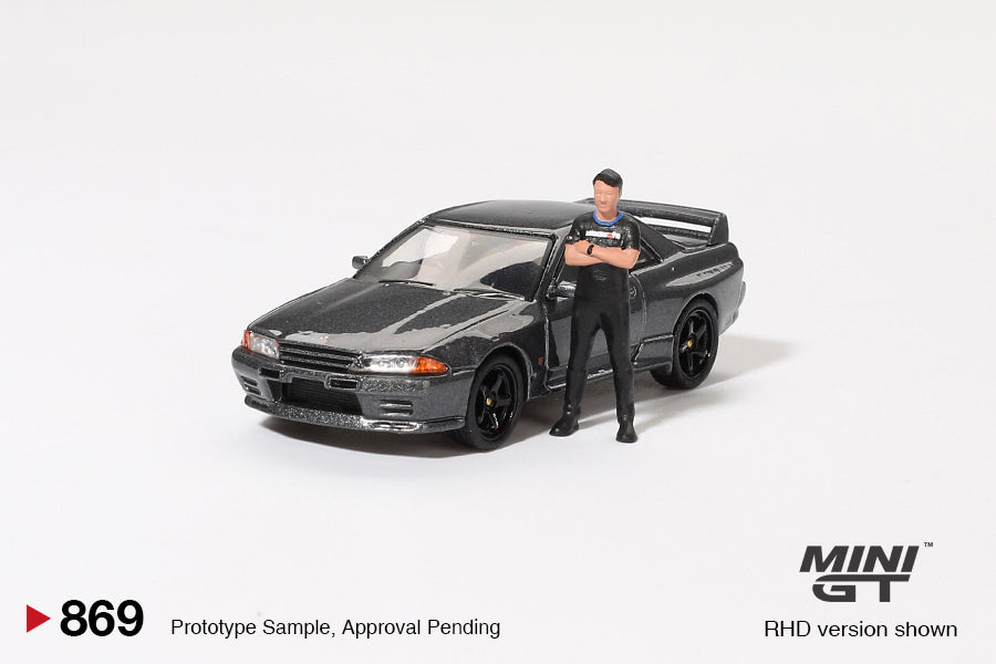 MINI GT #869 1/64 Nissan Skyline GT-R (R32) Gunmetal W/ Matsuda Figure Tsugio Matsuda Collection