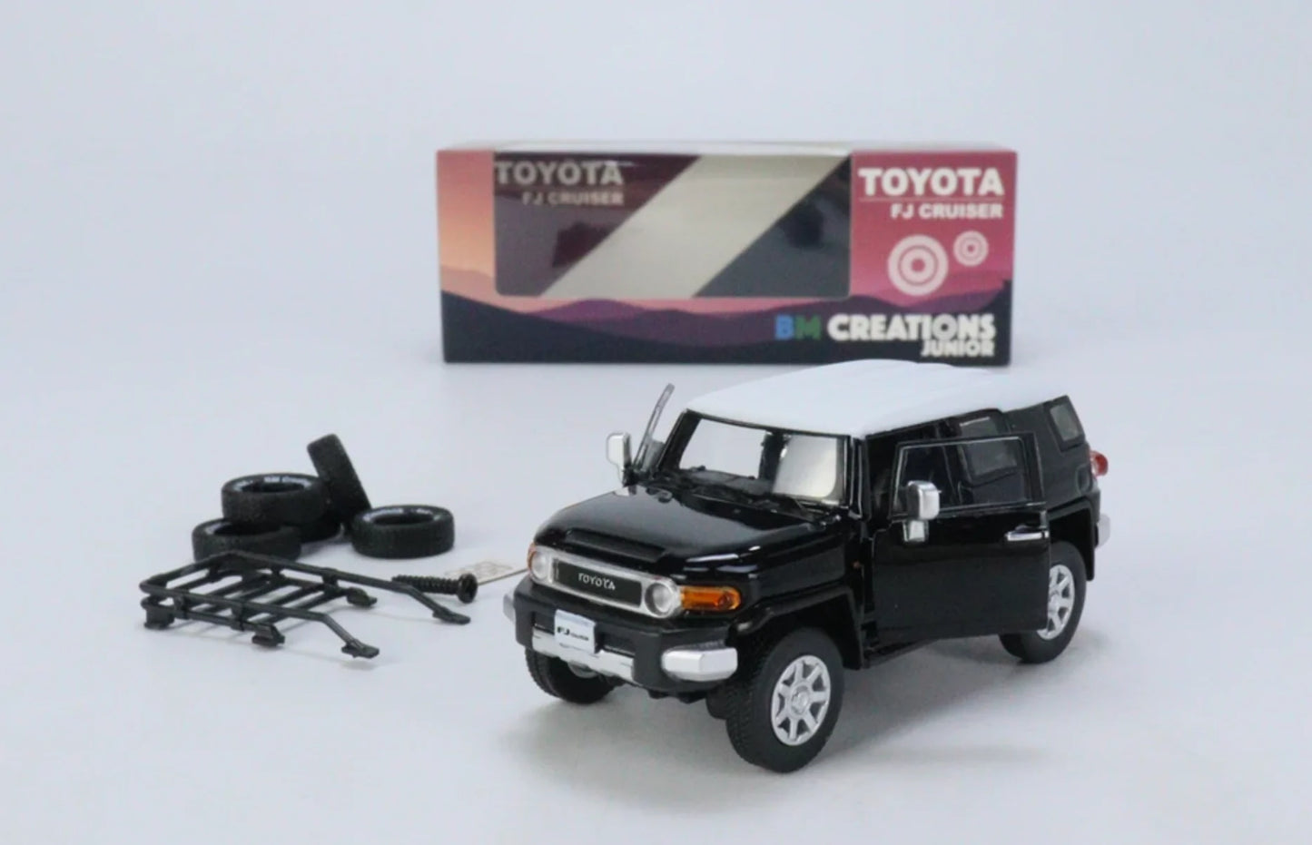 BM CREATION JUNIOR 1/64 TOYOTA 2015 FJ CRUSIER BLACK - RIGHT HAND DRIVE