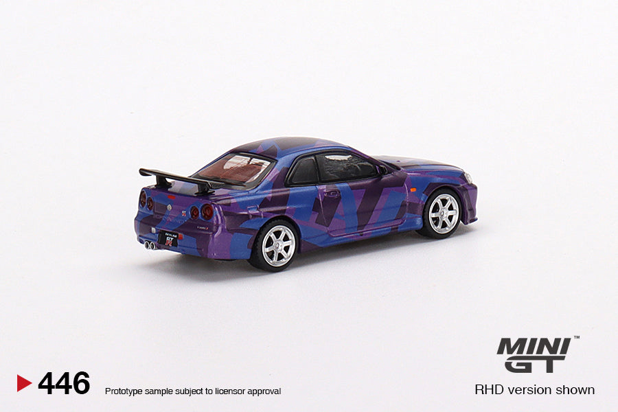 MINI GT #446 1/64 Nissan Skyline GT-R (R34) V-Spec II MINI GT Digital Camouflage Purple