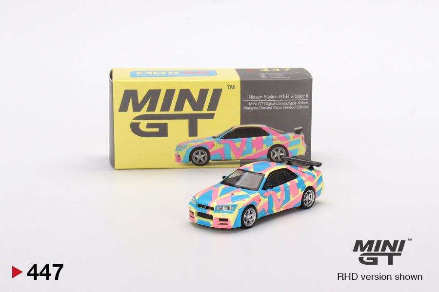MINI GT #447 1/64 Nissan Skyline GT-R (R34)V-Spec ll MINI GT Digital Camouflage Yellow (RHD)