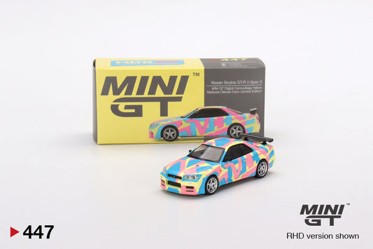 MINI GT #447 1/64 Nissan Skyline GT-R (R34)V-Spec ll MINI GT Digital Camouflage Yellow (RHD)