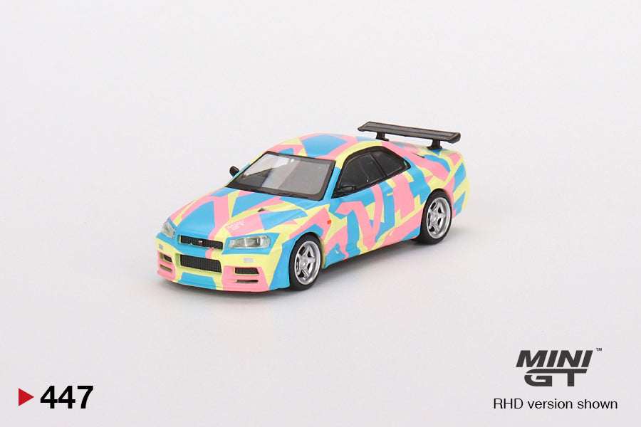 MINI GT #447 1/64 Nissan Skyline GT-R (R34)V-Spec ll MINI GT Digital Camouflage Yellow (RHD)