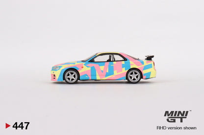 MINI GT #447 1/64 Nissan Skyline GT-R (R34)V-Spec ll MINI GT Digital Camouflage Yellow (RHD)
