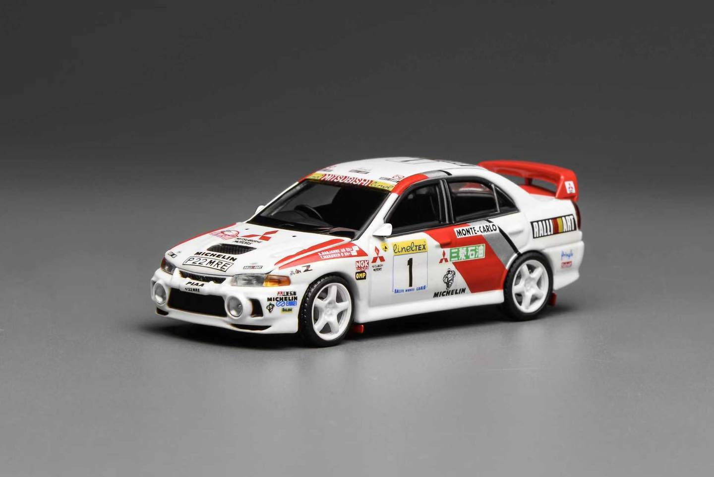 MOTORHELIX 1/64 MITSUBISHI LANCER EVOLUTION IV GSR MONTE CARLO LIVERY M64010