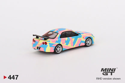 MINI GT #447 1/64 Nissan Skyline GT-R (R34)V-Spec ll MINI GT Digital Camouflage Yellow (RHD)