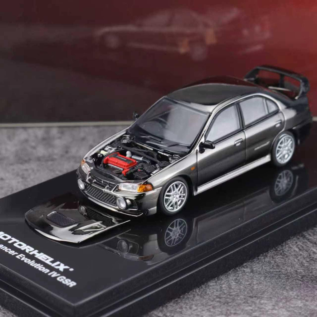 MOTORHELIX 1/64 MITSUBISHI LANCER EVOLUTION IV GSR CUSTOMIZED ELECTROPLATING GUN GRAY - M64009DZ-CY
