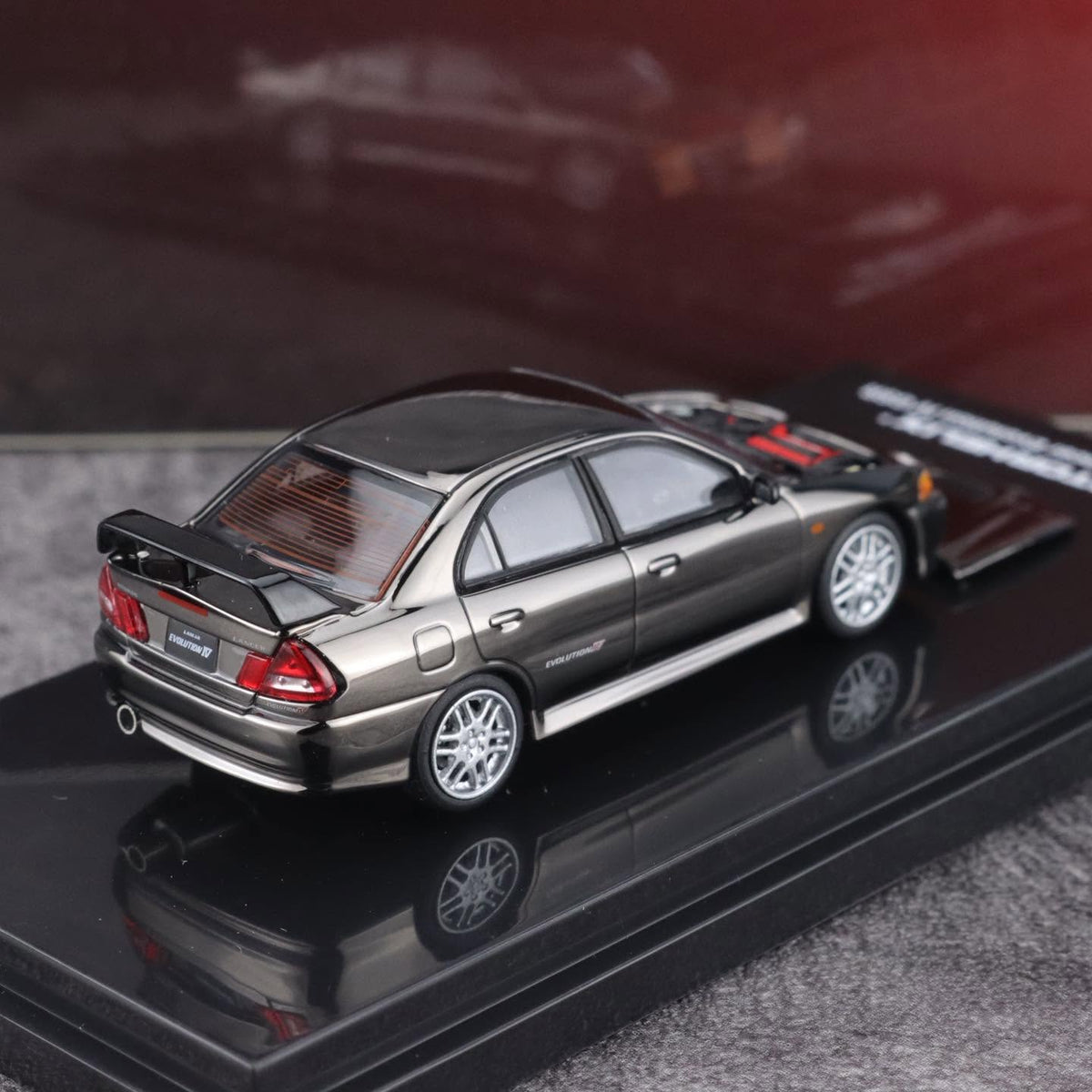 MOTORHELIX 1/64 MITSUBISHI LANCER EVOLUTION IV GSR CUSTOMIZED ELECTROPLATING GUN GRAY - M64009DZ-CY