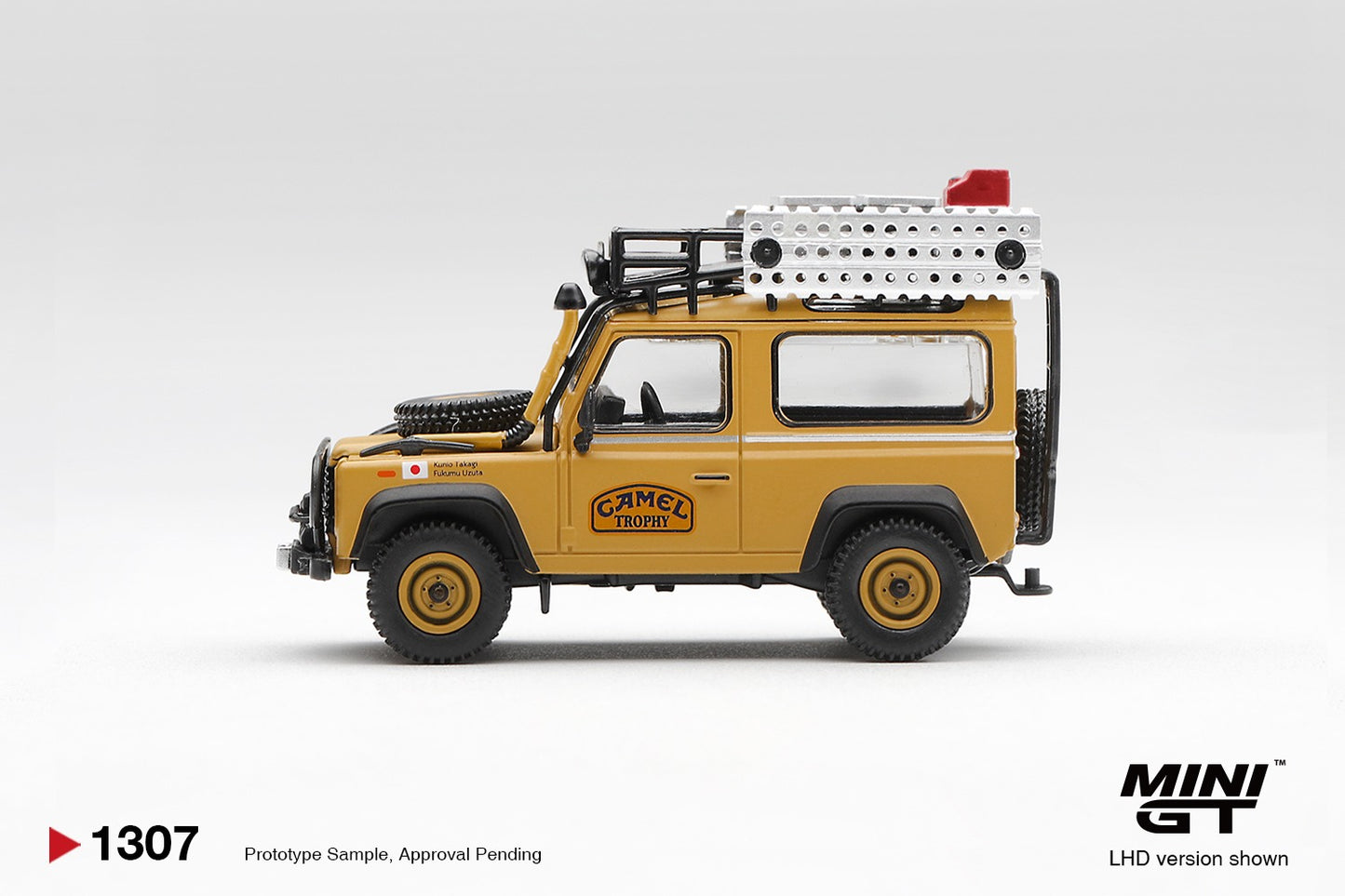 * PRE ORDER * MINI GT #1307 1/64 Land Rover Defender 90 1985 Camel Trophy Borneo Team Japan (LHD)