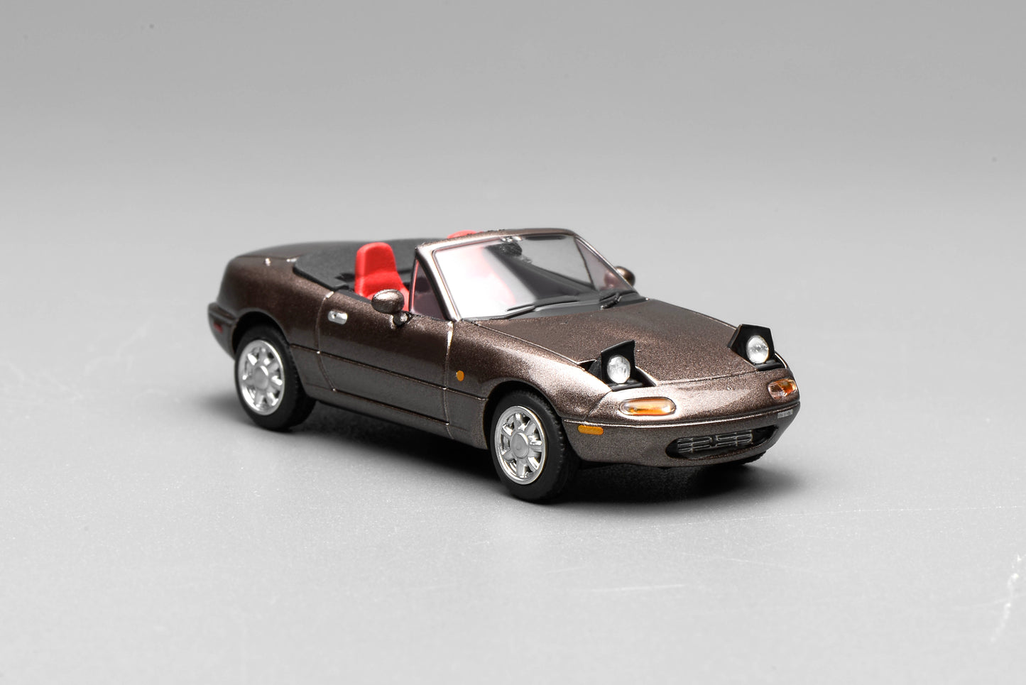 * PRE ORDER * MOTORHELIX 1/64 MAZDA EUNOS ROADSTER (NA) RHD  METALLIC BROWN  M60207R