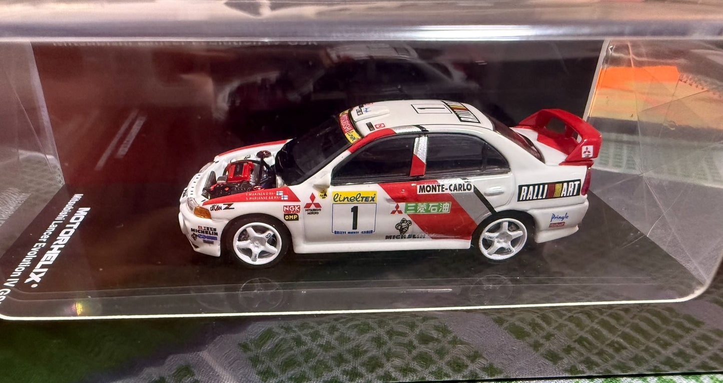 MOTORHELIX 1/64 MITSUBISHI LANCER EVOLUTION IV GSR MONTE CARLO LIVERY M64010