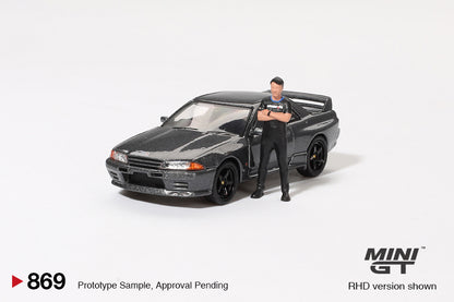 MINI GT #869 1/64 Nissan Skyline GT-R (R32) Gunmetal W/ Matsuda Figure Tsugio Matsuda Collection
