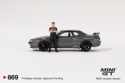 MINI GT #869 1/64 Nissan Skyline GT-R (R32) Gunmetal W/ Matsuda Figure Tsugio Matsuda Collection