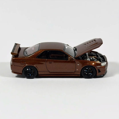 MOTORHELIX 1/64 Nissan Skyline GT-R R34 Nismo Customized Metallic Bronze M63466 - CHINA TOY EXPO
