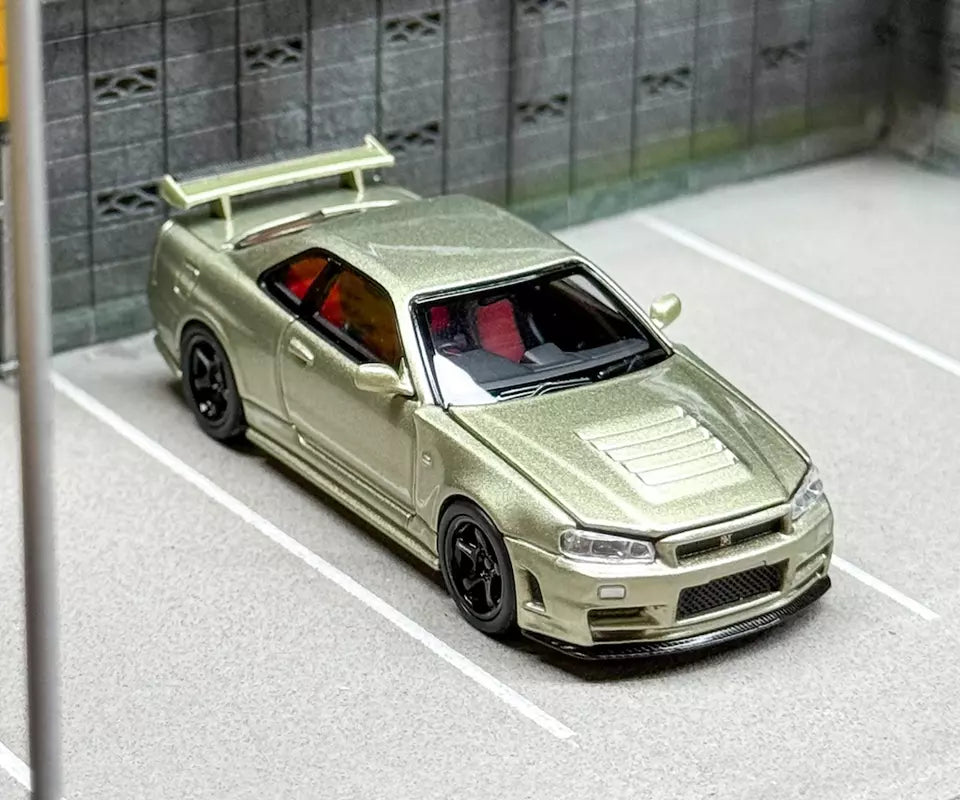 Motorhelix 1/64 NISSAN SKYLINE GT-R R34 V SPEC II  E - MILLENNIUM JADE M63405