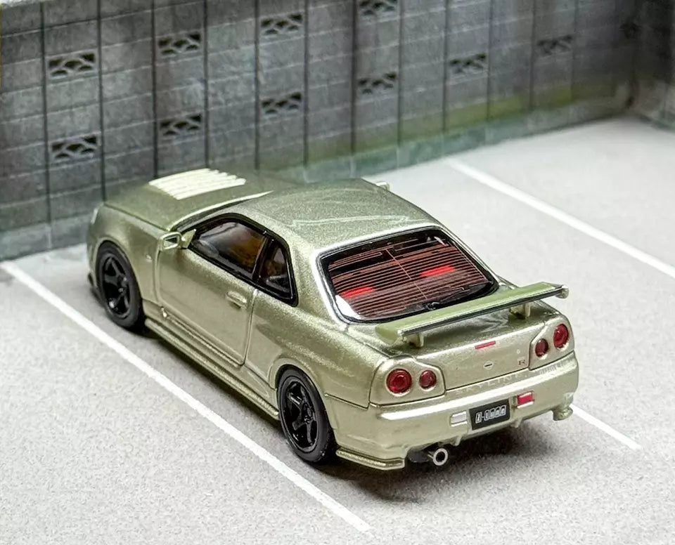 Motorhelix 1/64 NISSAN SKYLINE GT-R R34 V SPEC II  E - MILLENNIUM JADE M63405